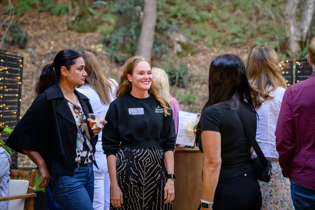 Guests mingling in the courtyard