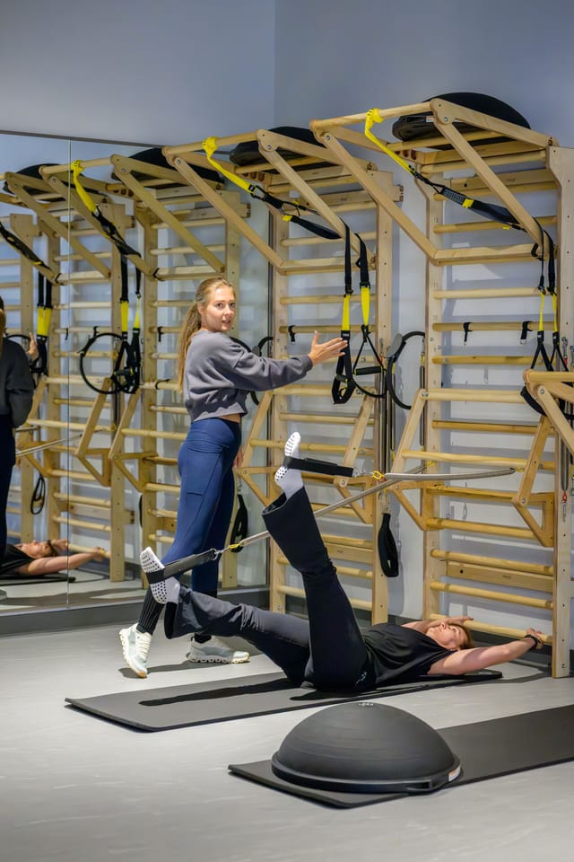 Guests try the wall units and suspension straps